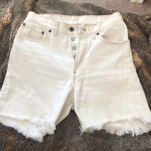 white distressed Levi high waisted shorts